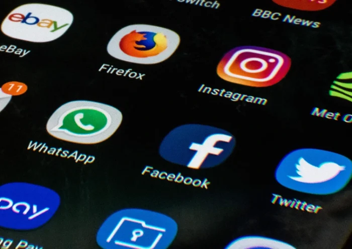 A mobile phone screen displays the icons for the social networking apps Facebook, Twitter and Instagram, taken in Manchester, England on March 22, 2018. - A public apology by Facebook chief Mark Zuckerberg failed Thursday to quell outrage over the hijacking of personal data from millions of people, as critics demanded the social media giant go much further to protect privacy. (Photo by Oli SCARFF / AFP) (Photo by OLI SCARFF/AFP via Getty Images)