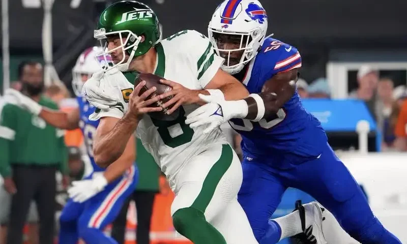 Buffalo Bills defensive end Leonard Floyd (56) sacks New York Jets quarterback Aaron Rodgers (8) during the first quarter at MetLife Stadium. Rogers left the game with an injury after the play. Mandatory Credit: Robert Deutsch-USA TODAY Sports/File Photo