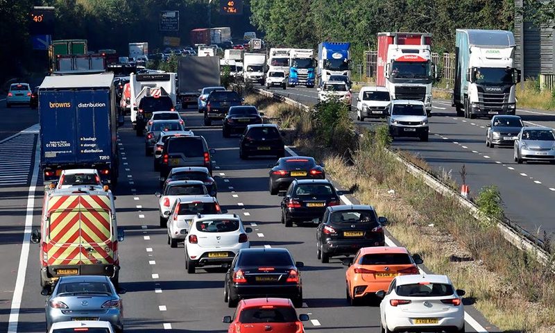 Heavy traffic as seen on the M3 motorway heading towards the English coast, near Southampton, Britain, August 7, 2020. REUTERS/Toby Melville/File photo