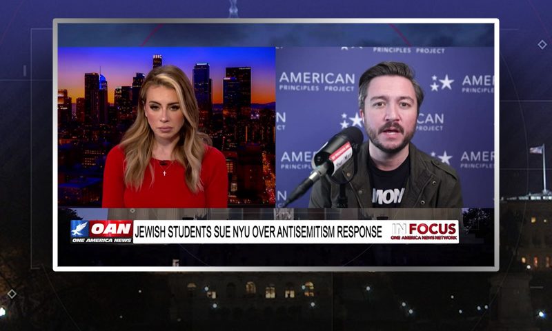 Video still from In Focus on One America News Network showing a split screen of the host on the left side, and on the right side is the guest, Terry Schilling.