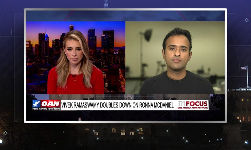 Video still from In Focus on One America News Network showing a split screen of the host on the left side, and on the right side is the guest, Vivek Ramaswamy.