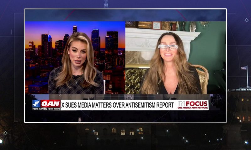 Video still from In Focus on One America News Network showing a split screen of the host on the left side, and on the right side is the guest, Charlene Bollinger.