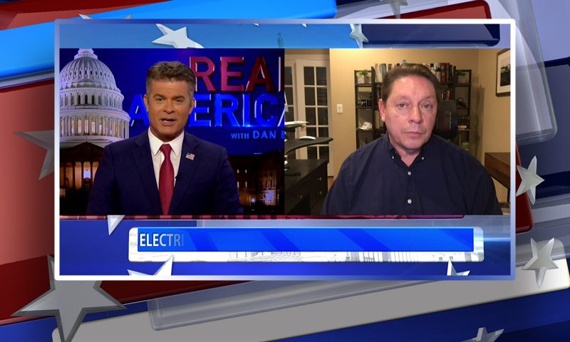 Video still from Real America on One America News Network showing a split screen of the host on the left side, and on the right side is the guest, Steve Milloy.