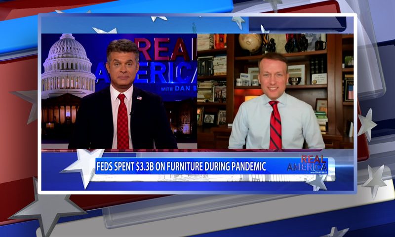 Video still from Real America on One America News Network showing a split screen of the host on the left side, and on the right side is the guest, Scott Presler.