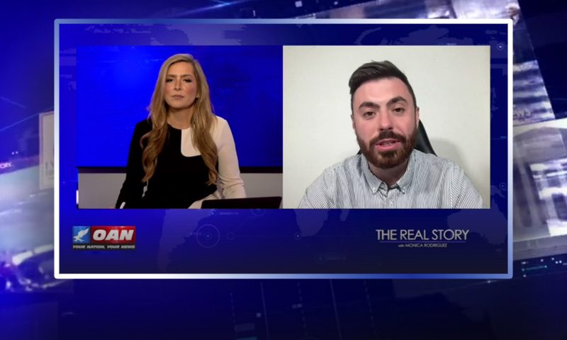 Video still from The Real Story on One America News Network showing a split screen of the host on the left side, and on the right side is the guest, Lewis Brackpool.