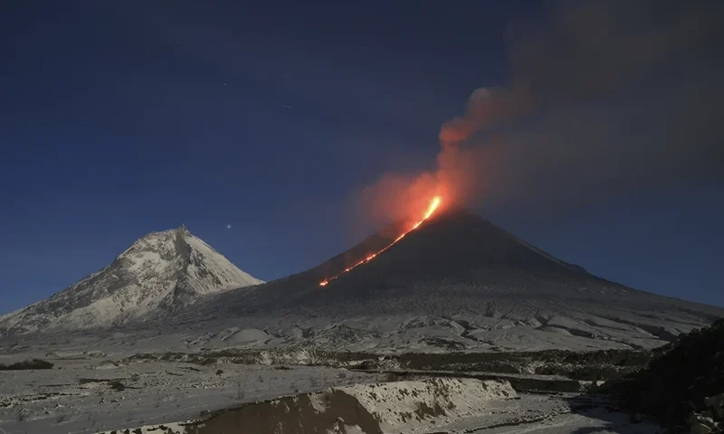 The Klyuchevskoy volcano, one of the highest active volcanoes in the world, erupts in Russia's northern Kamchatka Peninsula, Russian Far Eat, on Saturday, Oct. 28, 2023. Huge ash columns erupted from Eurasia's tallest active volcano on Wednesday, Nov. 1, 2023, forcing authorities to close schools in two towns in the region. (AP Photo/Yuri Demyanchuk)