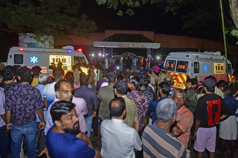 of 2 | People gather outside after a stampede at the venue of a music concert at the Cochin University of Science and Technology in Kochi, Kerala
state, India, Saturday, Nov.25, 2023. Four people died and dozens of students were injured in the incident. (AP Photo)