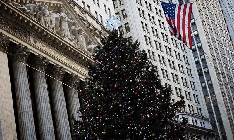 A Christmas tree is seen outside of the New York Stock Exchange (NYSE) in New York City, U.S., December 15, 2023. REUTERS/Brendan McDermid/File Photo