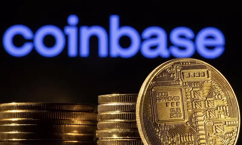 A representation of the cryptocurrency is seen in front of Coinbase logo in this illustration taken, March 4, 2022. REUTERS/Dado Ruvic/Illustration/File Photo