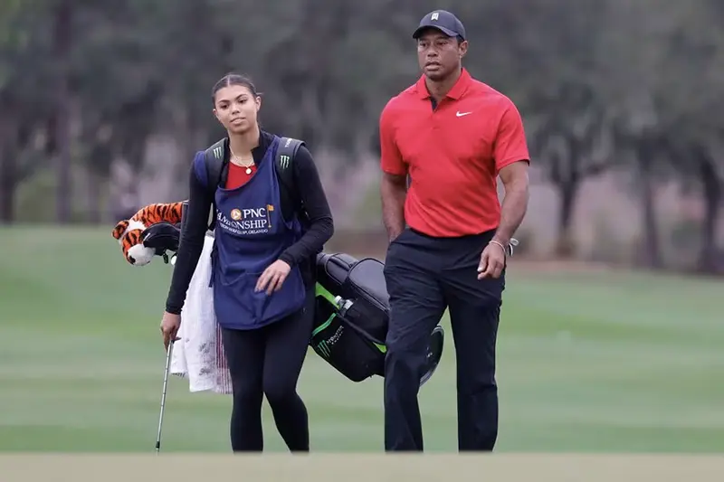 Tiger Woods walks onto the 18th green with his daughter Sam Woods during the PNC Championship at The Ritz-Carlton Golf Club. Mandatory Credit: Reinhold Matay-USA TODAY Sports