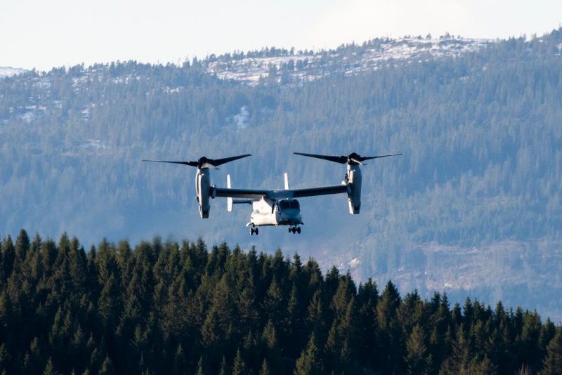 TOPSHOT - The United States' V-22 Osprey, a multi-mission, tiltrotor military aircraft with both vertical takeoff and landing, flies during a joint demonstration as part of the NATO Trident Juncture 2018 exercise in Byneset near Trondheim, Norway, October 30, 2018. Trident Juncture 2018, is a NATO-led military exercise held in Norway from 25 October to 7 November 2018. The exercise is the largest of its kind in Norway since the 1980s. Around 50,000 participants from NATO and partner countries, some 250 aircraft, 65 ships and up to 10,000 vehicles take part in the exercise. The main goal of Trident Juncture is allegedly to train the NATO Response Force and to test the alliance's defence capability. (Photo by Jonathan NACKSTRAND / AFP) (Photo by JONATHAN NACKSTRAND/AFP via Getty Images)