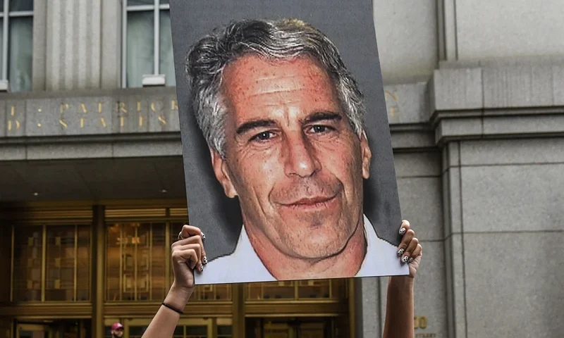 Jeffrey Epstein Appears In Manhattan Federal Court On Sex Trafficking Charges NEW YORK, NY - JULY 08: A protest group called "Hot Mess" hold up signs of Jeffrey Epstein in front of the federal courthouse on July 8, 2019 in New York City. According to reports, Epstein will be charged with one count of sex trafficking of minors and one count of conspiracy to engage in sex trafficking of minors. (Photo by Stephanie Keith/Getty Images)