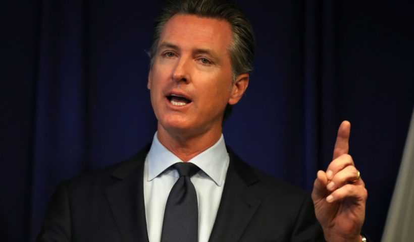 SACRAMENTO, CALIFORNIA - SEPTEMBER 18: California Gov. Gavin Newsom speaks during a news conference at the California justice department on September 18, 2019 in Sacramento, California. California Gov. Gavin Newsom, California attorney general Xavier Becerra and California Air Resources Board Chair Mary Nichols held a news conference in response to the Trump Administration's plan to revoke California’s waiver to establish vehicle emissions standards for greenhouse gas emissions and standards to require manufacturers to sell zero emissions vehicles. Under the federal Clean Air Act, California is allowed to set its own vehicle emissions standards that are at least as protective as the federal government’s standards. The state has received 100 waivers from the Environmental Protection Agency (EPA) for higher standards than federally mandated over the past 50 years. (Photo by Justin Sullivan/Getty Images)