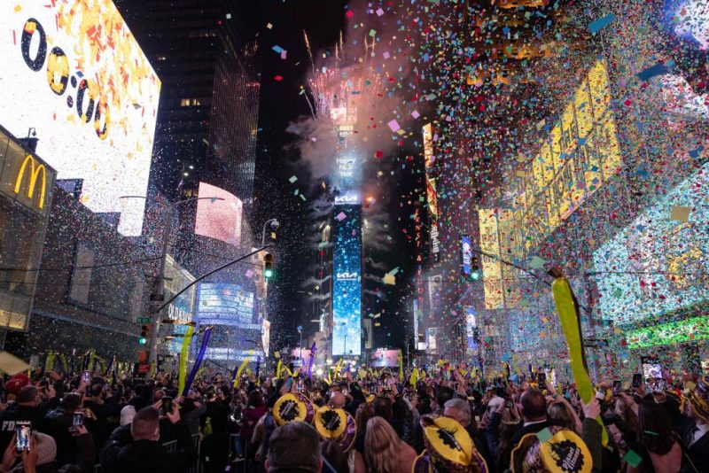 Confetti flies in the air at Times Square on New Year's Eve in New York City on December 31, 2021. (Photo by Yuki IWAMURA / AFP) (Photo by YUKI IWAMURA/AFP via Getty Images)