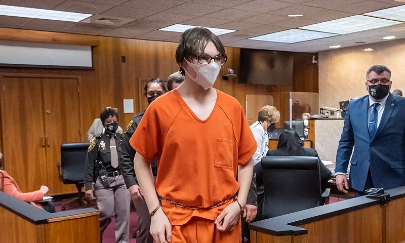 PONTIAC, MICHIGAN - FEBRUARY 22: Ethan Crumbley is led away from the courtroom after a placement hearing at Oakland County Circuit Court on February 22, 2022 in Pontiac, Michigan. Crumbley, 15, is charged with the fatal shooting of four fellow students and the wounding of seven others, including a teacher at Oxford High School on November 30, 2021. (Photo by David Guralnick-Pool/Getty Images)