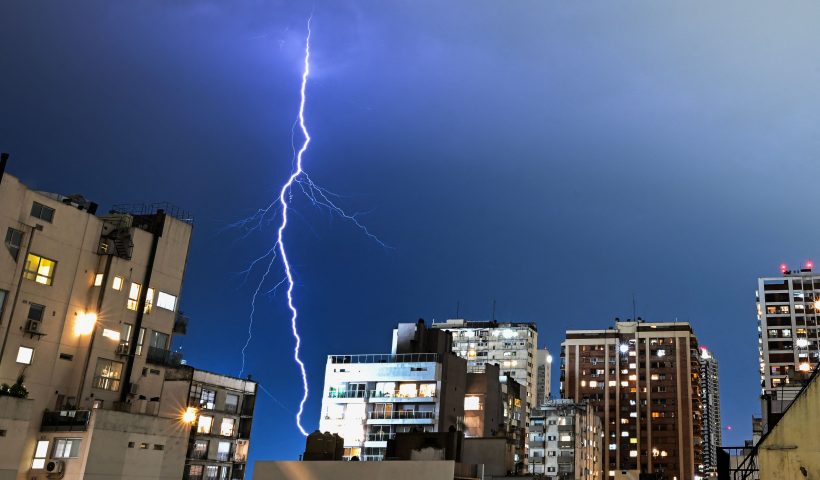 TOPSHOT-ARGENTINA-WEATHER-FEATURE TOPSHOT - A lightning strikes the city of Buenos Aires during a storm on May 23, 2023. (Photo by LUIS ROBAYO / AFP) (Photo by LUIS ROBAYO/AFP via Getty Images)
