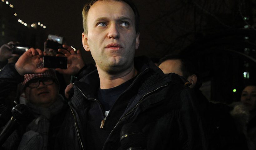 Anti-Kremlin blogger Alexei Navalny speaks to journalists and supporters outside a police station in Moscow, early on December 21, 2011. Russia freed today Navalny and other opposition activists after they served 15-day jail terms for taking part in an unsanctioned rally protesting election results. AFP PHOTO / ANDREY SMIRNOV (Photo credit should read ANDREY SMIRNOV/AFP via Getty Images)