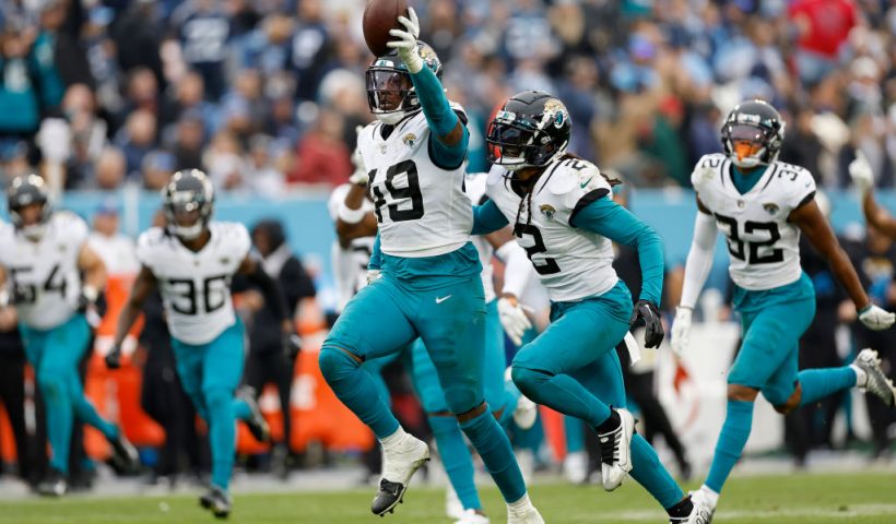 NASHVILLE, TENNESSEE - DECEMBER 11: Arden Key #49 of the Jacksonville Jaguars celebrates after recovering a fumble in the fourth quarter of the game against the Tennessee Titans at Nissan Stadium on December 11, 2022 in Nashville, Tennessee. (Photo by Wesley Hitt/Getty Images)