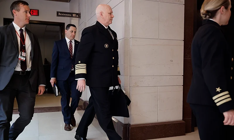 WASHINGTON, DC - APRIL 19: Navy Admiral Christopher Grady (C), vice chairman of the Joint Chiefs, arrives for a closed-door briefing with senators about the Discord leaks at the U.S. Capitol Visitors Center on April 19, 2023 in Washington, DC. Jack Teixeira, a 21-year-old airman in the Massachusetts Air National Guard, was arrested and charged with espionage after sharing classified military documents with a gaming group he belonged to on the internet social app Discord. (Photo by Chip Somodevilla/Getty Images)