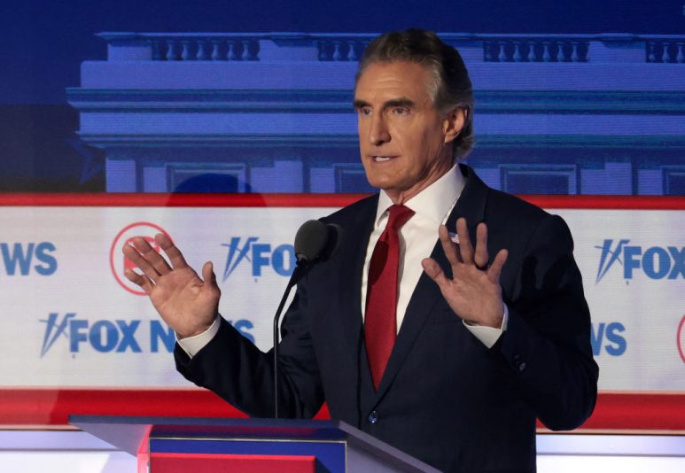 MILWAUKEE, WISCONSIN - AUGUST 23: Republican presidential candidate, North Dakota governor Doug Burgum participates in the first debate of the GOP primary season hosted by FOX News at the Fiserv Forum on August 23, 2023 in Milwaukee, Wisconsin. Eight presidential hopefuls squared off in the first Republican debate as former U.S. President Donald Trump, currently facing indictments in four locations, declined to participate in the event. (Photo by Win McNamee/Getty Images)