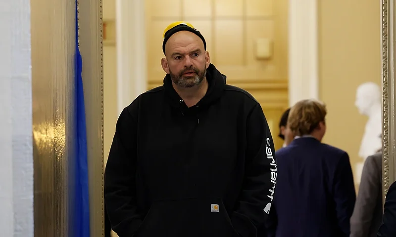 WASHINGTON, DC - NOVEMBER 15: U.S. Sen. John Fetterman (D-PA) departs from the Senate Chambers in the U.S. Capitol Building on November 15, 2023 in Washington, DC. The U.S. Senate passed short-term funding legislation in an 87 to 11 vote to fund the U.S. government through early 2024. (Photo by Anna Moneymaker/Getty Images)