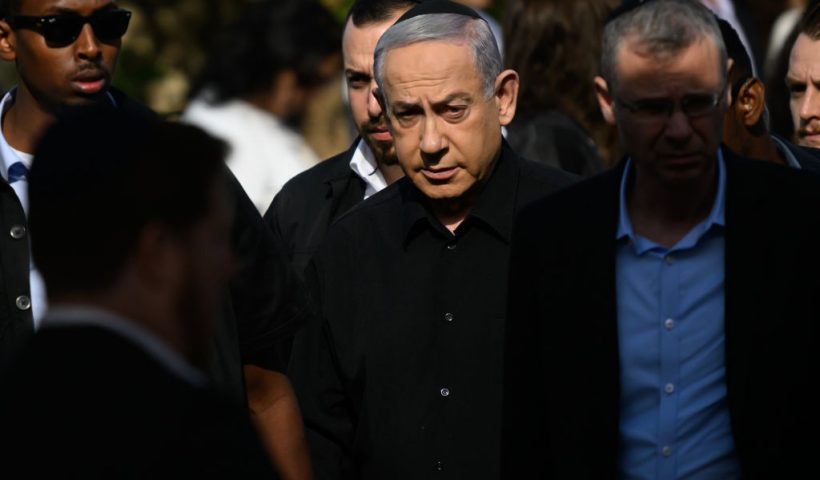HERZLIYA, ISRAEL - DECEMBER 08: Prime Minister Benjamin Netanyhu attends the funeral for First Sergeant Major Gal Meir Eisenkot (aged 25) in the Herzliya cemetery on December 8, 2023 in Herzliya, Israel. The Israel Defense Forces said the 25-year-old major, son of the cabinet minister and former army chief Gadi Eisenkot, died on Thursday in Gaza. Over two months have passed since the Oct. 7 attacks by Hamas that sparked a retaliatory ground and air campaign by Israel in Gaza. (Photo by Alexi J. Rosenfeld/Getty Images)