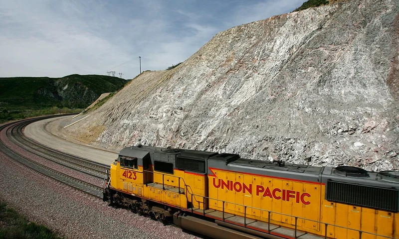 SAN BERNARDINO, CA - MAY 15: A freight train passes diagonally-shifted layers of earth as it crosses the San Andreas Rift Zone, the system of depressions in the ground between the parallel faults of the San Andreas earthquake fault, on heavily-used railroad tracks in Cajon Canyon on May 15, 2008 west of San Bernardino, California. New calculations reveal a 99.7 percent chance that a magnitude 6.7 quake or larger will strike by 2037, according to the first-ever statewide temblor forecast released by the scientists of the United States Geological (USGS), Southern California Earthquake Center and California Geological Survey last month. Scientists have particular concern for the people living along the southern portion of the 800-mile-long San Andreas Fault east of Los Angeles. This section of the fault has had very little slippage for more than 300 years and has built up immense pressure that could release an earthquake of historic proportions at any time. Such a quake could produce a sudden lateral movement of 23 to 32 feet and be would be among the largest ever recorded. Experts have predicted that a quake of magnitude-7.6 or greater on the southern San Andreas would kill thousands of people and cause many billions of dollars in damages, dwarfing the 1994 Northridge disaster near Los Angeles that killed 72 people, injured more than 9,000 and caused $25 billion in damage. (Photo by David McNew/Getty Images)