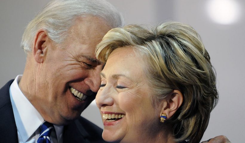 SCRANTON, PA - OCTOBER 12: Democratic vice presidential candidate U.S. Senator Joe Biden (D-DE) and U.S. Sen. Hillary Clinton (D-NY) smile at a rally in support of Democratic presidential nomineee U.S. Sen. Barack Obama (D-IL)October 12, 2008 in Scranton, Pennsylvania. With family ties to Scranton, both Biden and Clinton have teamed up to rally supporters in Pennsylvania before moving on to campaign for Obama in battleground states. (Photo by Jeff Fusco/Getty Images)