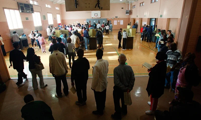 BIRMINGHAM, AL - NOVEMBER 04: African-Americans line up to vote in a recreation center in the presidential election November 4, 2008 in Birmingham, Alabama. Birmingham, along with Selma and Montgomery, were touchstones in the civil rights movement where Dr. Martin Luther King Jr. led massive protests which eventually led to the Voting Rights Act of 1965 ending voter disfranchisement against African-Americans. Americans are voting in the first presidential election featuring an African-American candidate, Democratic contender Sen. Barack Obama, who is running against Republican Sen. John McCain. (Photo by Mario Tama/Getty Images)