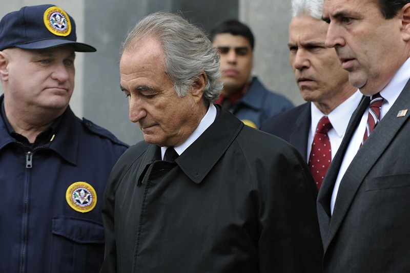 Disgraced Wall Street financier Bernard
Disgraced Wall Street financier Bernard Madoff leaves US Federal Court after a hearing on March 10, 2009 in New York. Madoff has agreed to plead guilty to 11 counts of fraud, his lawyer said in court. AFP PHOTO/Timothy A. CLARY (Photo credit should read TIMOTHY A. CLARY/AFP via Getty Images)