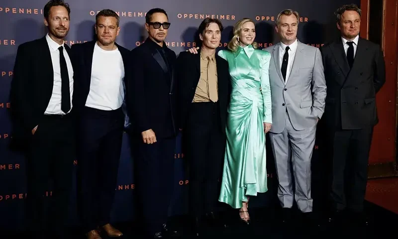 Cast members Trond Fausa Aurvag, Matt Damon, Robert Downey Jr., Cillian Murphy, Emily Blunt, Jason Clarke, and Director Christopher Nolan pose during a photocall before the premiere of the film "Oppenheimer" at the Grand Rex in Paris, France, July 11, 2023. REUTERS/Sarah Meyssonnier/File Photo