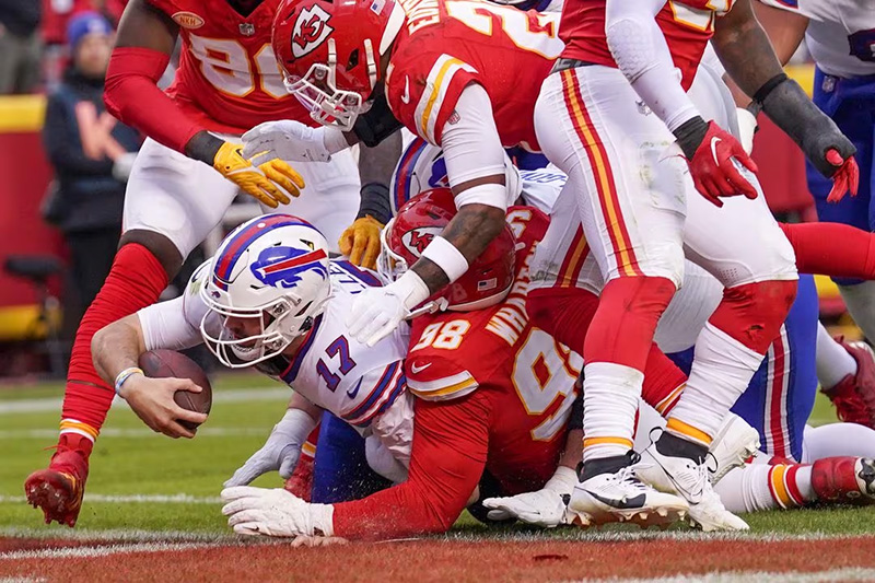 Buffalo Bills quarterback Josh Allen (17) scores a touchdown against the Kansas City Chiefs during the first half at GEHA Field at Arrowhead Stadium. Mandatory Credit: Denny Medley-USA TODAY Sports/File Photo