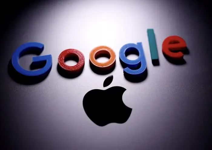 A 3D printed Google logo is placed on the Apple Macbook in this illustration taken April 12, 2020. REUTERS/Dado Ruvic/Illustration/File Photo