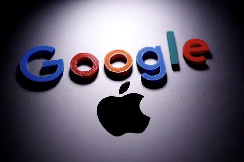 A 3D printed Google logo is placed on the Apple Macbook in this illustration taken April 12, 2020. REUTERS/Dado Ruvic/Illustration/File Photo