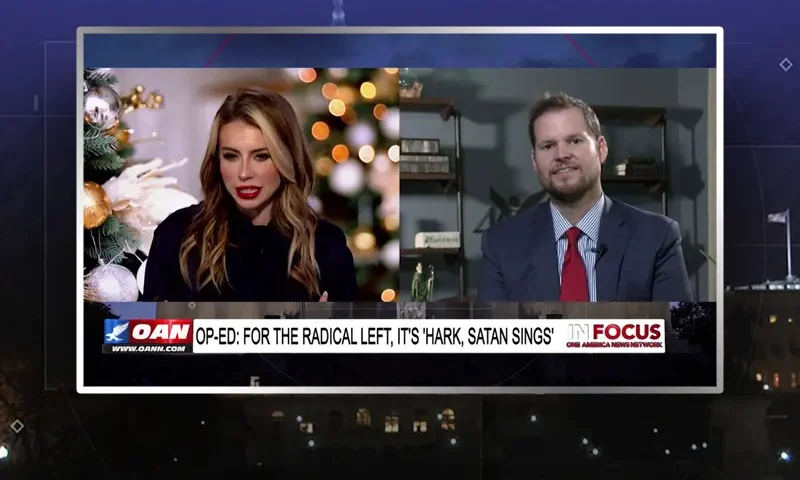 Video still from In Focus on One America News Network showing a split screen of the host on the left side, and on the right side is the guest, Shawn Carney.