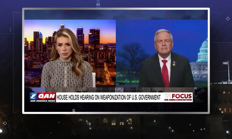 Video still from In Focus on One America News Network showing a split screen of the host on the left side, and on the right side is the guest, Rep. Ralph Norman.