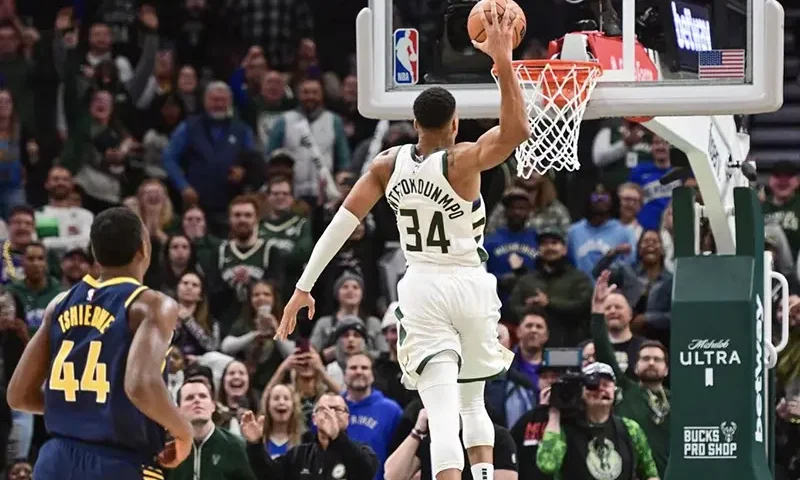 Milwaukee Bucks forward Giannis Antetokounmpo (34) scores 64 points in the fourth quarter against the Indiana Pacers to set a team record for most points scored in a game at Fiserv Forum. Mandatory Credit: Benny Sieu-USA TODAY Sports