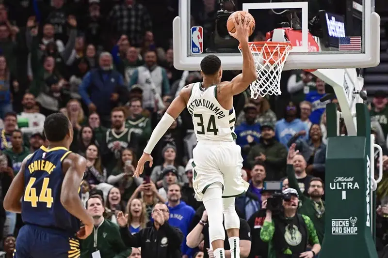 Milwaukee Bucks forward Giannis Antetokounmpo (34) scores 64 points in the fourth quarter against the Indiana Pacers to set a team record for most points scored in a game at Fiserv Forum. Mandatory Credit: Benny Sieu-USA TODAY Sports