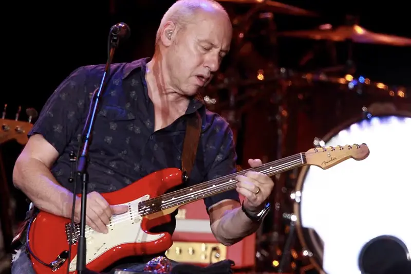 British guitarist Mark Knopfler performs during the 44th Montreux Jazz Festival in Montreux July 15, 2010. REUTERS/Denis Balibouse/File Photo
