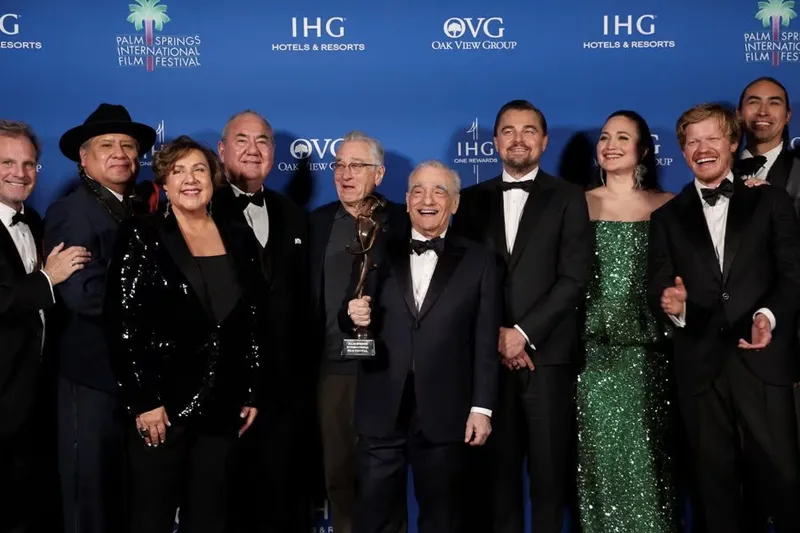 Martin Scorsese and the cast of "Killers of the Flower Moon," pose with the Vanguard Award at the 35th Annual Palm Springs International Film Festival Film Awards in Palm Springs, California, U.S., January 4, 2024. REUTERS/Mario Anzuoni