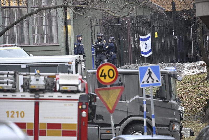 Officers stand near the Israeli Embassy in Stockholm, Sweden, Wednesday, Jan. 31, 2024. An object said to be “sharp” was found outside the Israeli Embassy in Stockholm on Wednesday, and was eventually destroyed. Dozens of officers were dispatched to the scene and sealed off the area before a bomb squad arrived. (Henrik Montgomery/TT News Agency via AP)