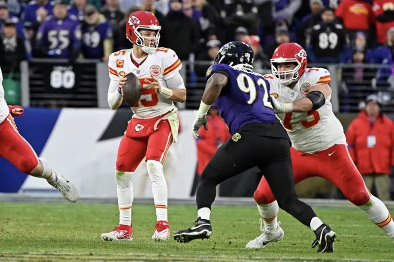 Kansas City Chiefs quarterback Patrick Mahomes (15) looks to pass the ball against the Baltimore Ravens during the second half in the AFC Championship football game at M&T Bank Stadium. Mandatory Credit: Tommy Gilligan-USA TODAY Sports