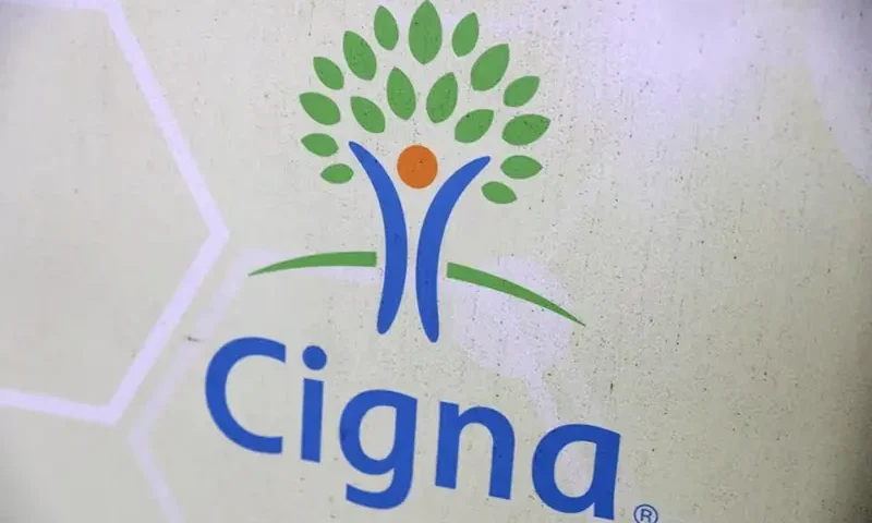 Signage for Cigna is pictured at a health facility in Queens, New York City, U.S., November 30, 2021. REUTERS/Andrew Kelly/File Photo
