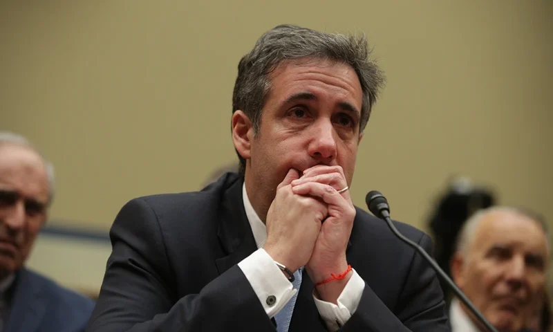 Former Trump Lawyer Michael Cohen Testifies Before House Oversight Committee WASHINGTON, DC - FEBRUARY 27: Michael Cohen, former attorney and fixer for President Donald Trump, gets emotional listening to Rep. Elijah Cummings (D-MD) give his closing statement after Cohen testified before the House Oversight Committee on Capitol Hill February 27, 2019 in Washington, DC. Last year Cohen was sentenced to three years in prison and ordered to pay a $50,000 fine for tax evasion, making false statements to a financial institution, unlawful excessive campaign contributions and lying to Congress as part of special counsel Robert Mueller's investigation into Russian meddling in the 2016 presidential elections. (Photo by Alex Wong/Getty Images)