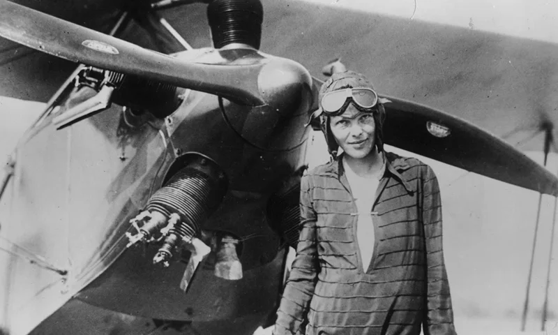 Ameila Earhart With Airplane 394033 03: (FILE PHOTO) Amelia Earhart stands June 14, 1928 in front of her bi-plane called "Friendship" in Newfoundland. Carlene Mendieta, who is trying to recreate Earhart's 1928 record as the first woman to fly across the US and back again, left Rye, NY on September 5, 2001. Earhart (1898 - 1937) disappeared without trace over the Pacific Ocean in her attempt to fly around the world in 1937. (Photo by Getty Images)