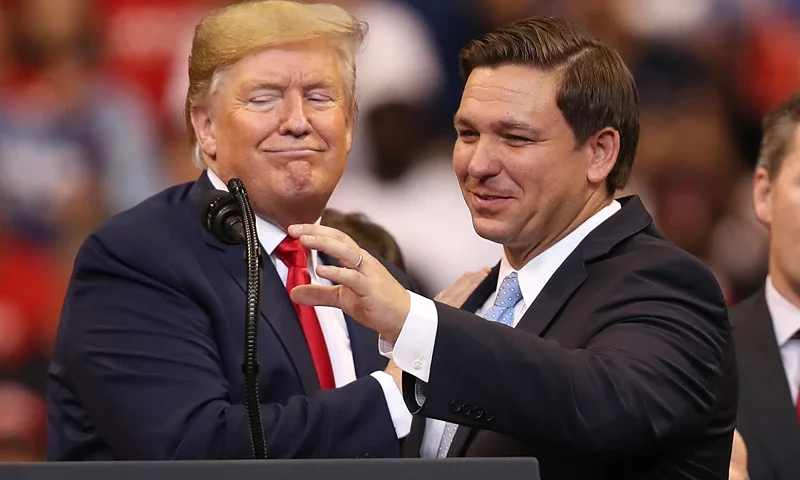 Donald Trump Holds A "Welcome Home" Rally In South Florida SUNRISE, FLORIDA - NOVEMBER 26: U.S. President Donald Trump introduces Florida Governor Ron DeSantis during a homecoming campaign rally at the BB&T Center on November 26, 2019 in Sunrise, Florida. President Trump continues to campaign for re-election in the 2020 presidential race. (Photo by Joe Raedle/Getty Images)