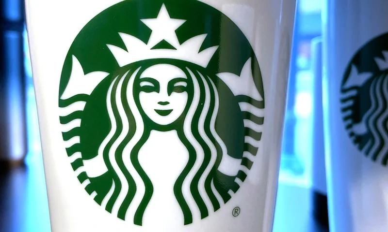 US-ECONOMY-EARNINGS The Starbucks emblem on reusable coffee cup in Annapolis, Maryland, on February 2, 2023, ahead of earnings report. (Photo by Jim WATSON / AFP) (Photo by JIM WATSON/AFP via Getty Images)