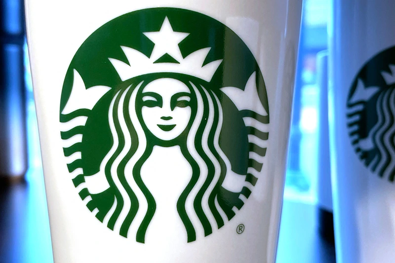 US-ECONOMY-EARNINGS
The Starbucks emblem on reusable coffee cup in Annapolis, Maryland, on February 2, 2023, ahead of earnings report. (Photo by Jim WATSON / AFP) (Photo by JIM WATSON/AFP via Getty Images)