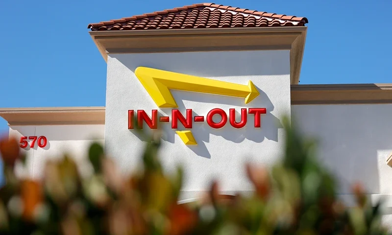 In-N-Out Burger Clashes With Local Governments Over Vaccine Verification Mandates PLEASANT HILL, CALIFORNIA - OCTOBER 28: The In-n-Out logo is displayed on the front of an In-n-Out restaurant on October 28, 2021 in Pleasant Hill, California. Contra Costa county health officials shut down an In-n-Out restaurant in Pleasant Hill on Tuesday after the popular burger chain ignored repeated warnings to check the vaccination cards of customers who wanted to dine indoors. San Francisco health officials shut down the Fisherman's Wharf location for several days earlier in the month for the same issue. That location is currently only offering to go orders. (Photo by Justin Sullivan/Getty Images)