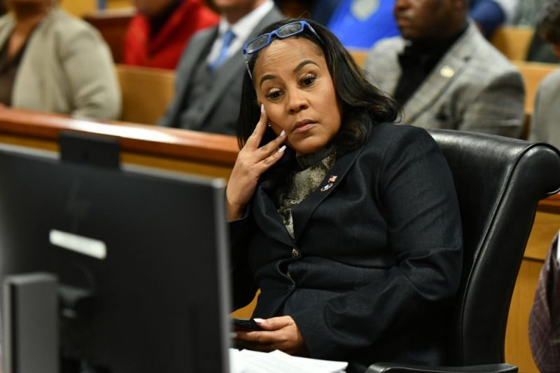 ATLANTA, GEORGIA - NOVEMBER 21: Fulton County District Attorney Fani Willis appears before Judge Scott McAfee for a hearing in the 2020 Georgia election interference case at the Fulton County Courthouse on November 21, 2023 in Atlanta, Georgia. Judge McAfee heard arguments as to whether co-defendant Harrison Floyd should be sent to jail for social media posts and comments that potentially targeted witnesses in the trial. McAfee declined to revoke Floyd's bond. Floyd was charged along with former US President Donald Trump and 17 others in an indictment that accuses them of illegally conspiring to subvert the will of Georgia voters in the 2020 presidential election. (Photo by Dennis Byron-Pool/Getty Images)